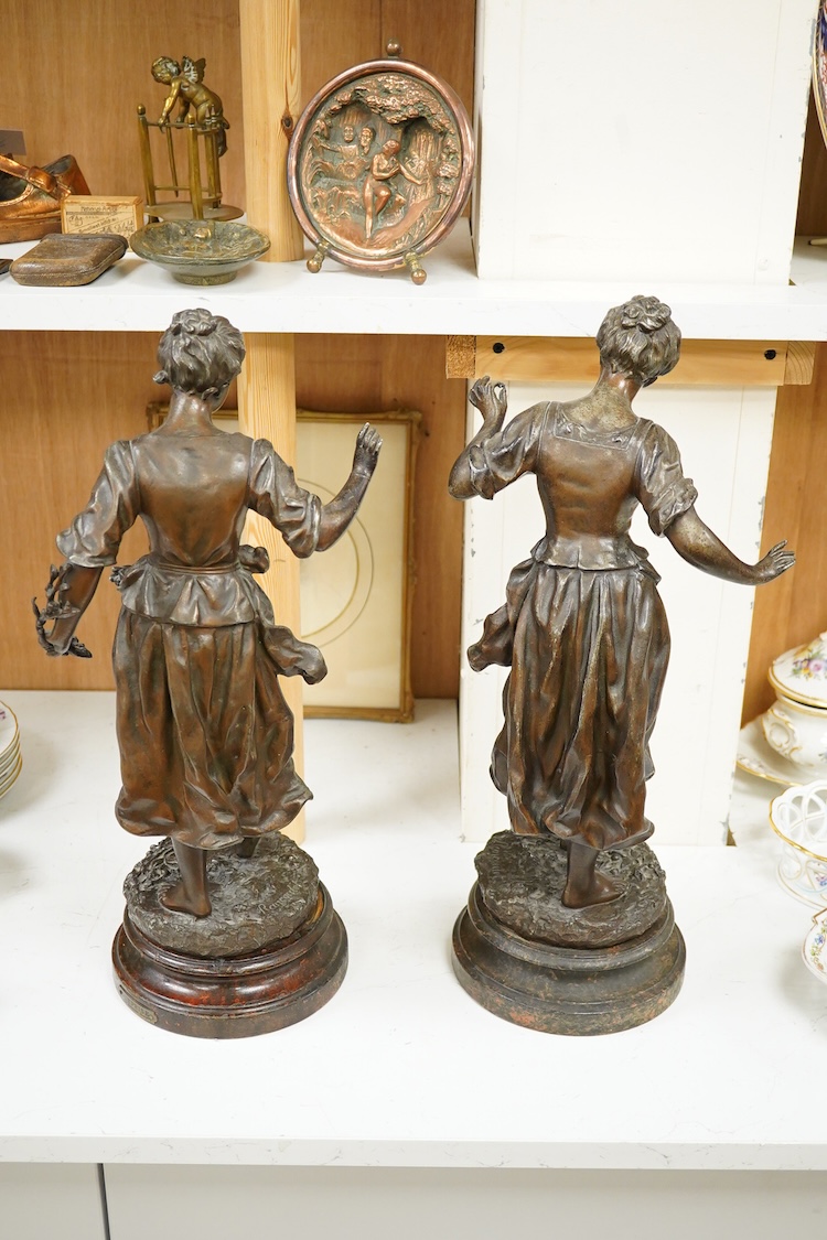 A pair of late 19th century French spelter figurines, 50cm high